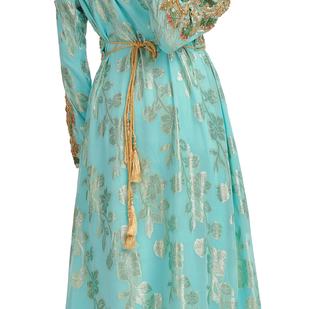 
                  
                    Crystal Hand work Kaftan on Turquoise Embossed Brasso - Maxim Creation
                  
                